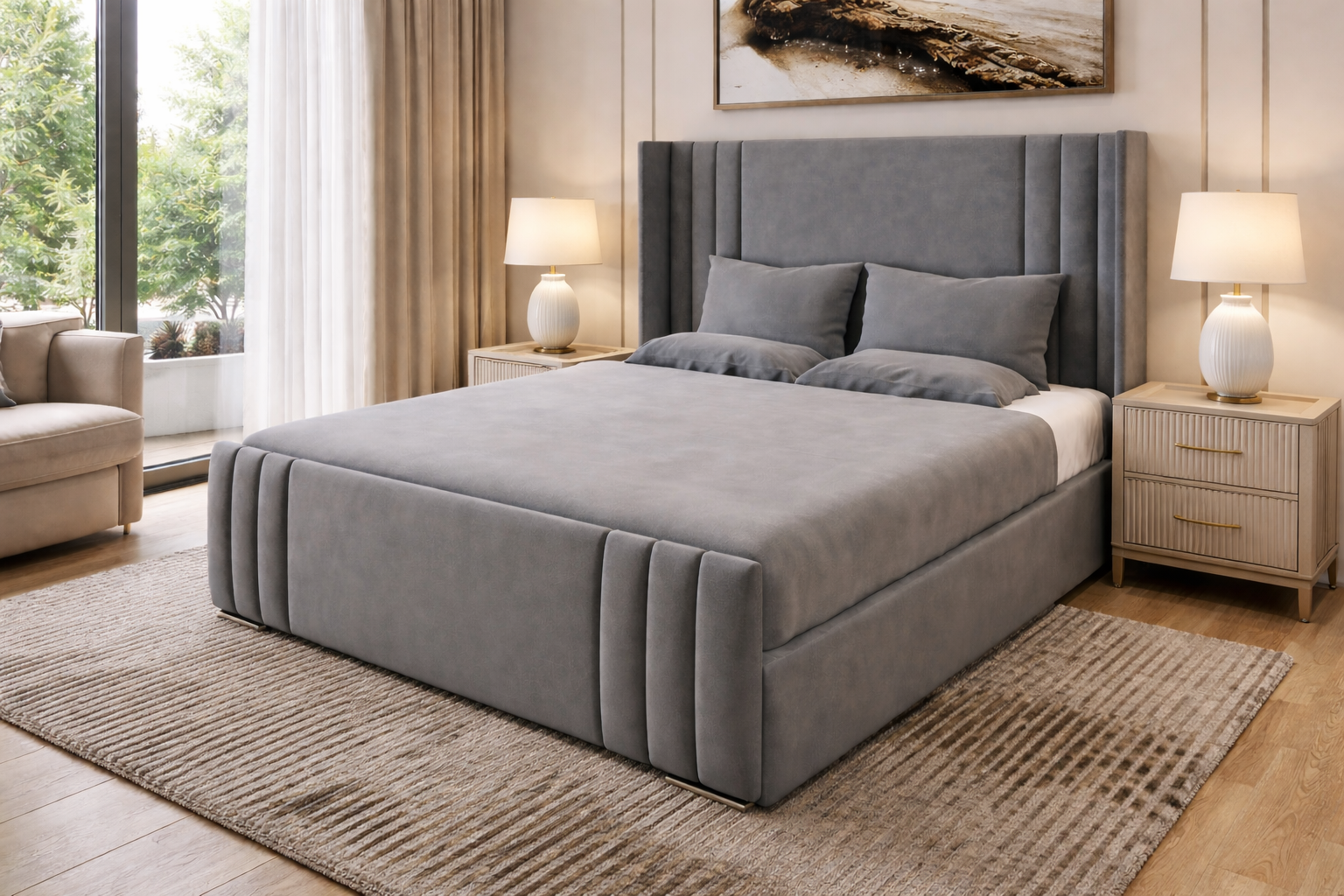 Gray upholstered bed in a bedroom setting with lamps and decor.
